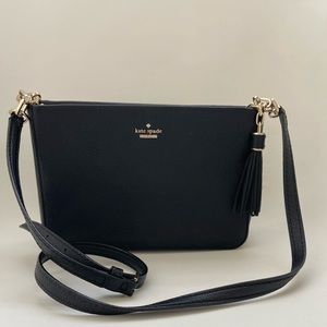 Kate Spade black leather crossbody with tassel
